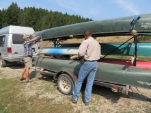 helping Mike unload the canoes